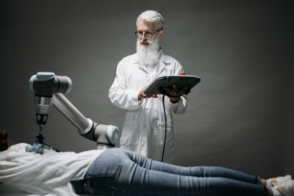 A patient is examined by a robot